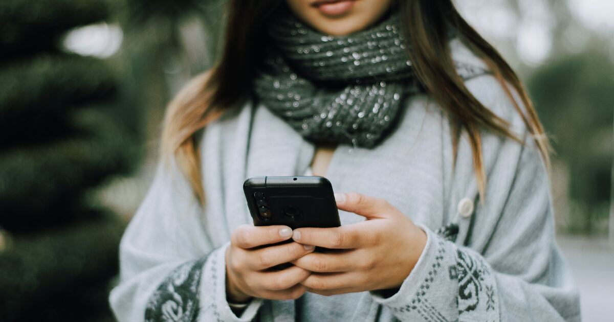 Two smartphones side by side, one showing a marketplace listing and one showing a trade proposal